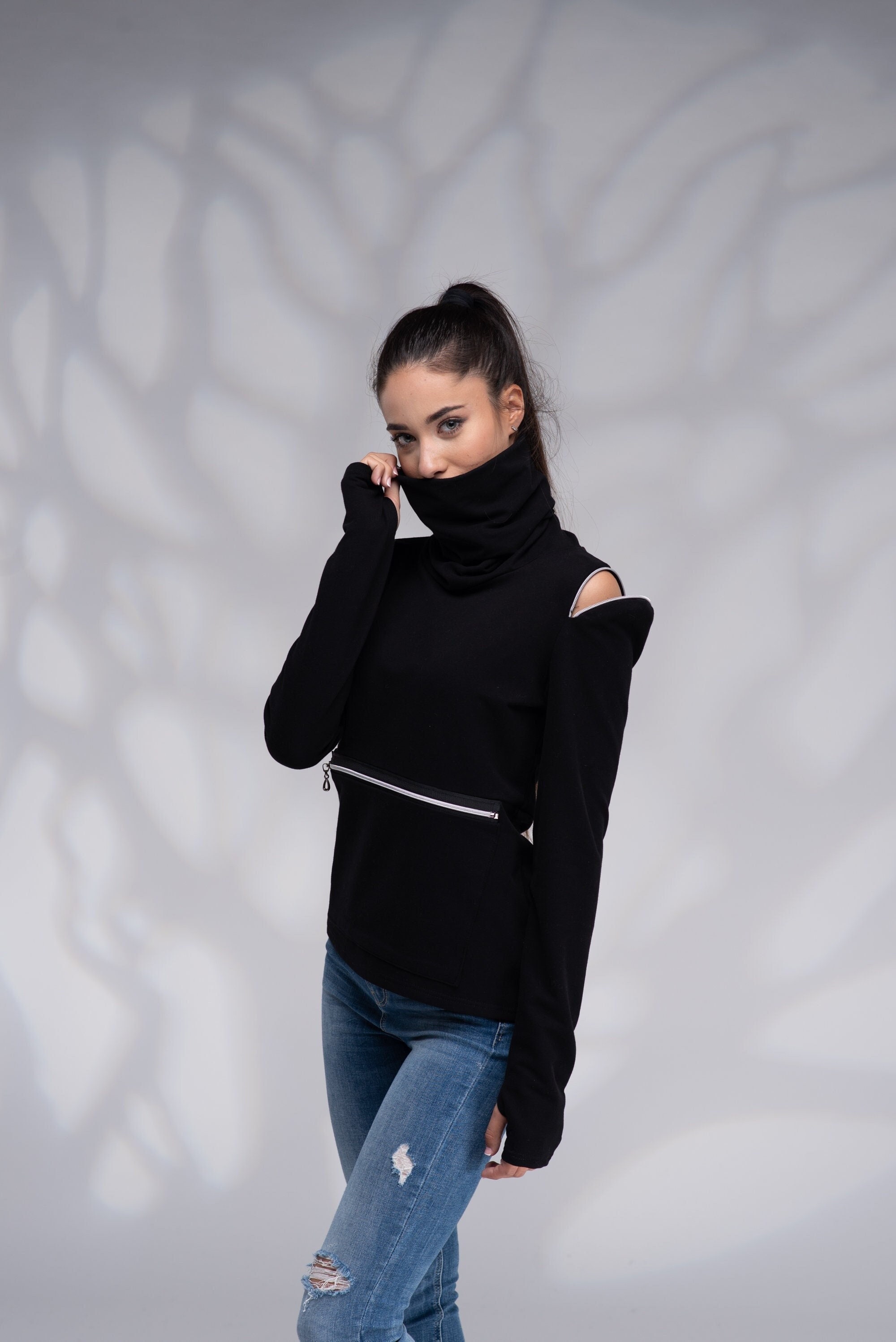 Black cold shoulder turtleneck hotsell