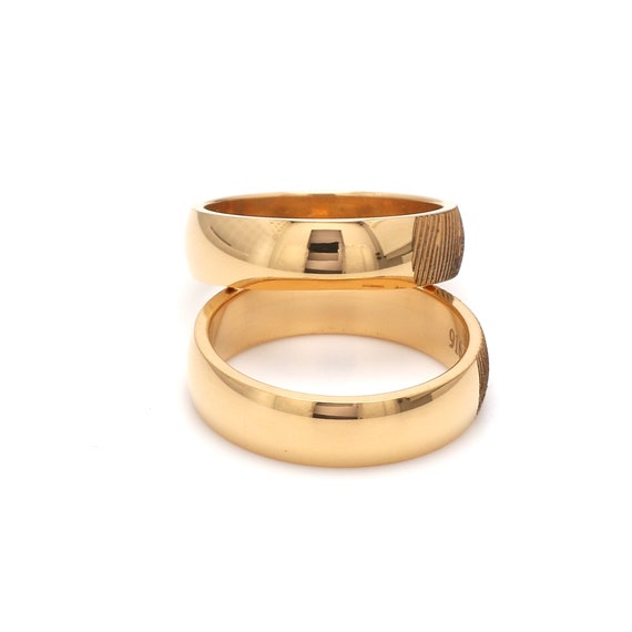 Platinum rings with outlet names engraved