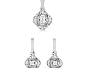 May include: A silver necklace and earrings set with a square pendant and matching earrings. The pendant and earrings feature a cluster of small diamonds in a floral design.