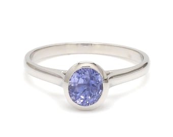 Anillo de platino con zafiro azul de corte ovalado para mujer JL PT 1196