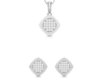May include: A silver pendant necklace and matching earrings with a square-shaped design featuring a round center filled with small white cubic zirconia stones.