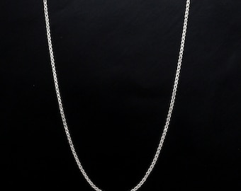 May include: A silver chain necklace with a delicate, braided design.