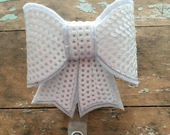 White sequin bow ID badge reel holder retractable clip