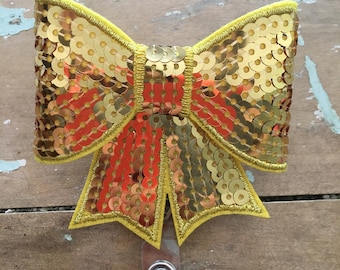 Gold sequin bow ID badge reel holder retractable clip