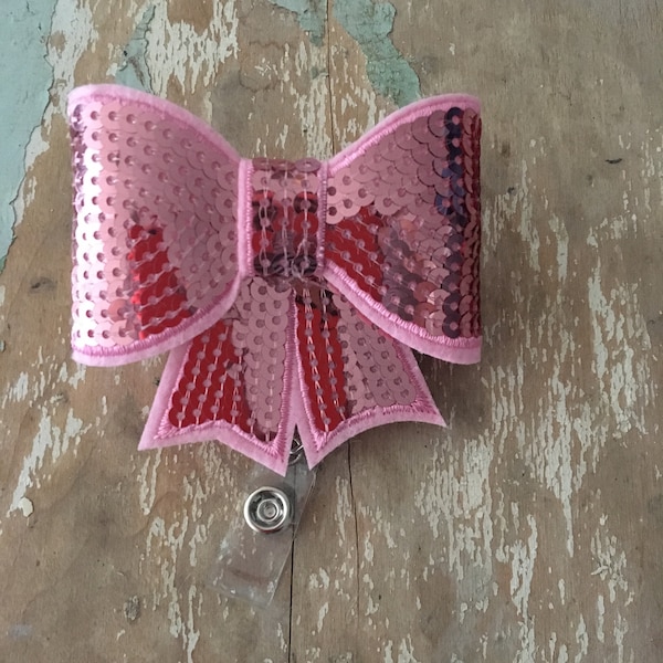 Bubble gum pink sequin bow ID badge reel holder retractable clip
