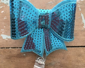 Aqua blue sequin bow ID badge reel holder retractable clip