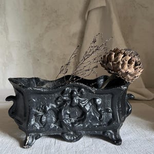 Antique French cast iron jardiniere planter garden bow relief France