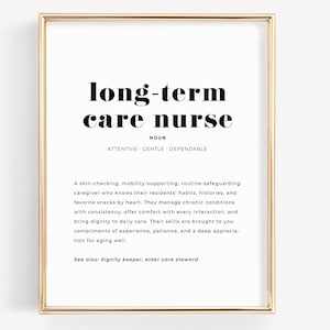 May include: A framed print with a gold-colored border. The print features the words "long-term care nurse" in a bold, black font. Below the title, the word "NOUN" is printed, followed by the words "ATTENTIVE GENTLE DEPENDABLE".