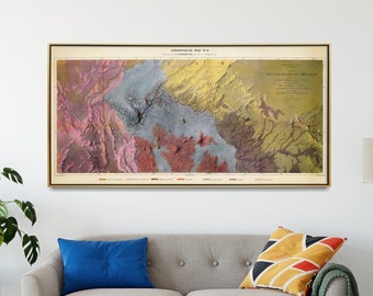 May include: A vintage-style map of the Grand Canyon, printed on paper with a light brown background. The map shows the geological formations of the canyon in various shades of red, yellow, and blue. The title of the map is "Geological Map of the Grand Canyon" and the text "A.C. SPENCER, 1911" is printed below the title.