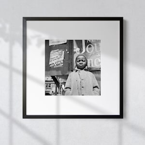 Street Chronicles: Vintage Black & White Print of a Harlem Newsboy, New York City