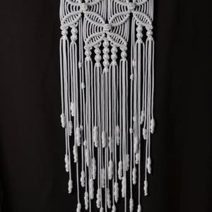 Decoração de interiores com parede de macramê