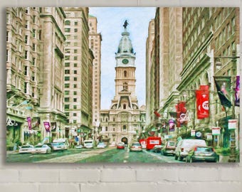 May include: A rectangular wall art print depicting a city street scene with tall buildings, a central clock tower, and a red bus. The painting features a palette of beige, grey, and green tones with pops of red from banners and vehicles.