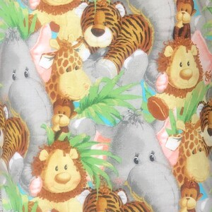 May include: A fabric pattern featuring a repeating illustration of cartoon jungle animals including tigers, giraffes, lions, monkeys, and elephants. The design incorporates green palm leaves and light blue accents against a soft, neutral background.