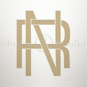 Peut inclure: Initiales entrelacées "NR" en monogramme de couleur dorée.