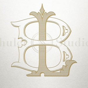 May include: A gold monogram with the letters "LB" intertwined in a decorative, ornate font.