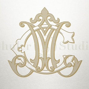 May include: A gold monogram with the letters "M" and "C" intertwined in a decorative, ornate design. The letters are surrounded by a circle with intricate flourishes.