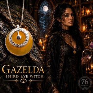 May include: A round pendant necklace featuring a smooth amber-colored disc with a textured silver-toned ring overlay and a central silver drop. The text "GAZELDA THIRD EYE WITCH" appears below the pendant alongside a stylized eye graphic.