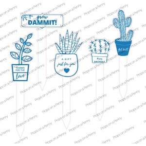 May include: Five blue and white garden stakes with different sayings. The stakes feature a cactus, a succulent, a plant, and two potted plants. The sayings on the stakes are "Grow Dammit!", "A Gift Just For You", "Happy Birthday", "Thanks For The Love", and "Get Well".