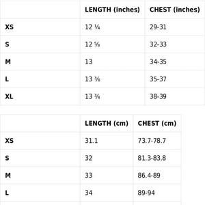 May include: Size guide chart with measurements in inches and centimeters. The chart includes sizes XS to XL, with corresponding chest and length measurements. Lengths range from 12 1/4 to 13 3/4 inches, and chests from 29 to 39 inches.