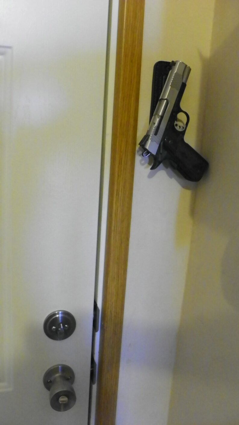 Concealable Leather gun holder rated 29 lbs by Etsy