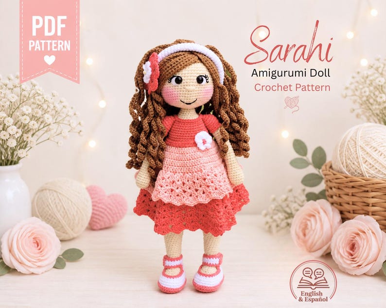 May include: A handmade amigurumi doll named Sarahi, crocheted in shades of red, pink, and brown. The doll has curly brown hair, a white headband, and a red dress. The image includes the text "PDF PATTERN" and "Sarahi Amigurumi Doll Crochet Pattern".