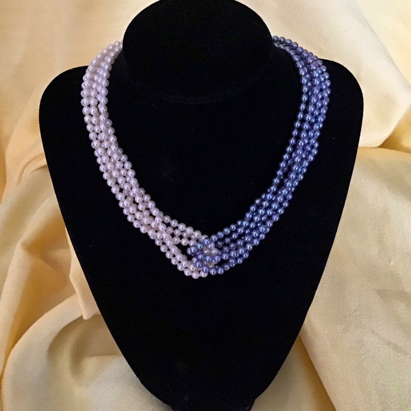 Majorica multi strand grey and white pearl torsade style necklace.