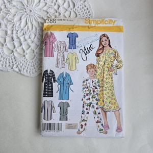May include: A Simplicity sewing pattern for making pyjamas for children and adults. The pattern includes a floral print nightgown, a plaid dressing gown, a blue dressing gown, a striped shirt, a plaid shirt, and a pair of pyjamas with a car print. The pattern is for sizes HH 3, 4, 5, and 6. The pattern is labelled "No Refund No Exchange".