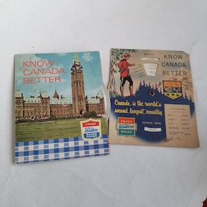 May include: Two vintage postcards promoting Canada. The first postcard features a photo of the Parliament Buildings in Ottawa, Ontario, with the text "Know Canada Better" and an advertisement for Weston's Baked Foods. The second postcard features a cartoon illustration of a Mountie with the text "Know Canada Better" and a map of Canada with the text "Canada is the world's second largest country".