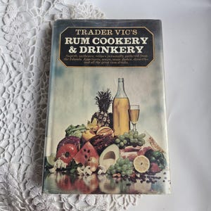 May include: A set of three ceramic nesting bowls in shades of blue, green, and white. The bowls feature a speckled glaze and a simple, modern design. The largest bowl measures approximately 8 inches in diameter.