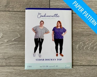 May include: A paper sewing pattern for a Cedar Dolman Top from Cashmerette Sewing for Curves. The pattern is for sizes 12-28 and cup sizes C-H. The pattern is labelled as beginner level.