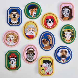 May include: Ten embroidered patches featuring various animals in different styles. The patches are circular and oval shaped with a gold beaded border. The animals include a cat, a dog, a bulldog, a chihuahua, a pug, a basset hound, a poodle, a greyhound, a terrier, and a sphinx cat.