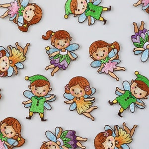 May include: Assortment of colourful embroidered iron-on patches featuring fairies and elves with wings, flowers, and stars.