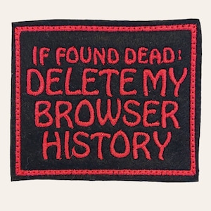 May include: A black rectangular patch with red embroidered text: "IF FOUND DEAD: DELETE MY BROWSER HISTORY." The patch has a red border and is likely made of felt or a similar fabric.