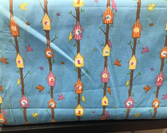 Blue with multi birds and bird boxes fabric