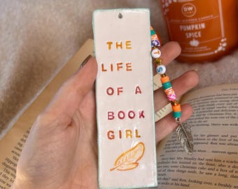 A vida de uma garota dos livros. Marcador de livros da Taylor Swift com charme.