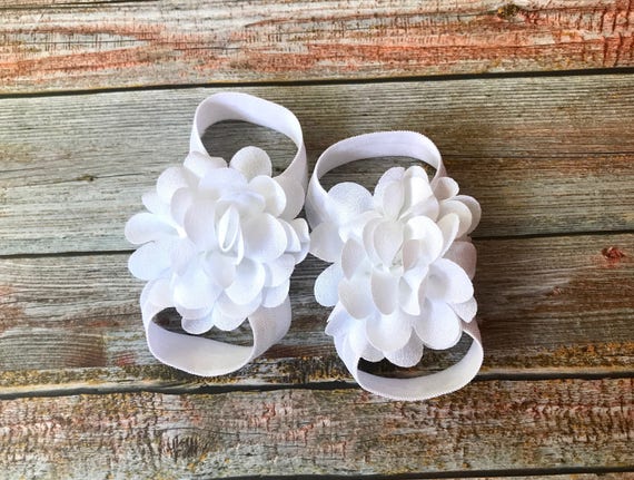 white newborn sandals
