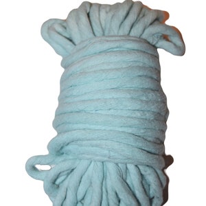 May include: A skein of light blue cotton rope, perfect for crafting projects.
