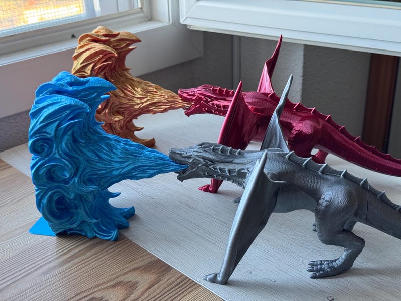 May include: Four dragon figurines, each with a different color and design. The dragons are made of plastic and are about 10 inches long. The dragons are arranged in a circle, with their heads facing each other.