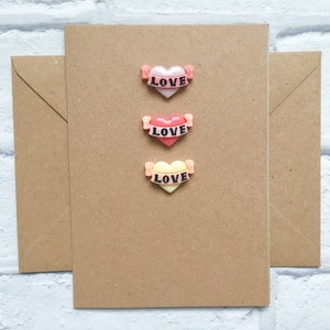 Carte de Saint-Valentin, carte Je t'aime, coeurs de tatouage