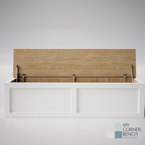 May include: A white storage bench with a light wood-grain lid that is partially open, revealing the interior. The bench has a rectangular shape with a clean, modern design. The bench is custom made.