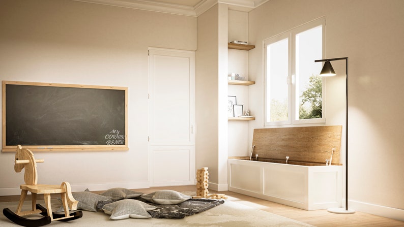 May include: A light-filled playroom featuring a chalkboard with the text "My Corner Bench", a wooden rocking horse, and a storage bench. The storage bench has a white base and a wooden top. A modern black floor lamp and cushions complete the scene.