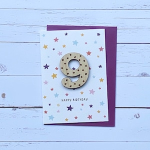 Carte d’anniversaire en bois de neuf ans