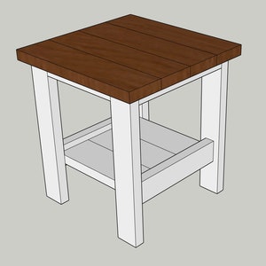 May include: A white wooden end table with a brown wood top and a shelf. The table has a simple, farmhouse style.
