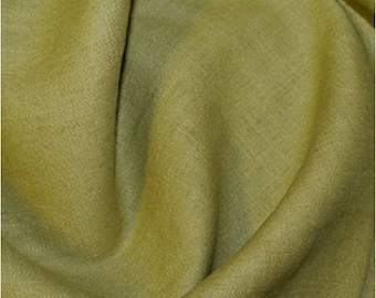 May include: A close-up of a soft, textured fabric in a muted green color. The fabric is wrinkled and has a natural, linen-like appearance.