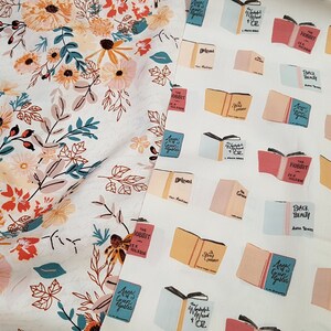 May include: Two white fabric swatches with different patterns. The left swatch has a floral pattern with orange, pink, and teal flowers. The right swatch has a repeating pattern of open books with titles like "Pride and Prejudice" and "The Hobbit".