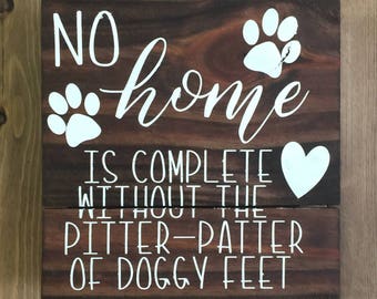 No home is complete without the pitter-patter of doggy feet reclaimed wood sign