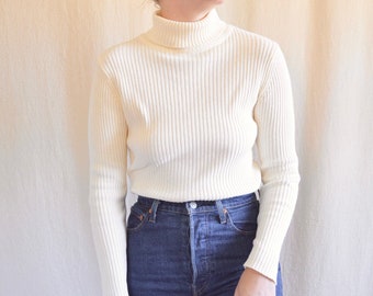 cream colored mock turtleneck