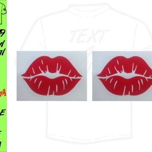 May include: Two red vinyl decals of a closed mouth with a slight pout. The decals are on a white background.