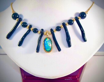 10 crt opal with black coral and 14k yellow gold