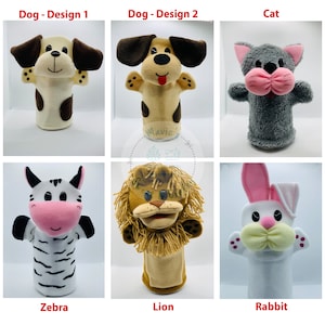 May include: A collection of handmade animal puppets, including a dog, cat, zebra, lion, and rabbit. The dog puppets have brown ears and spots. The cat is gray with a pink nose. The zebra has black and white stripes. The lion has a tan mane. The rabbit has pink ears.